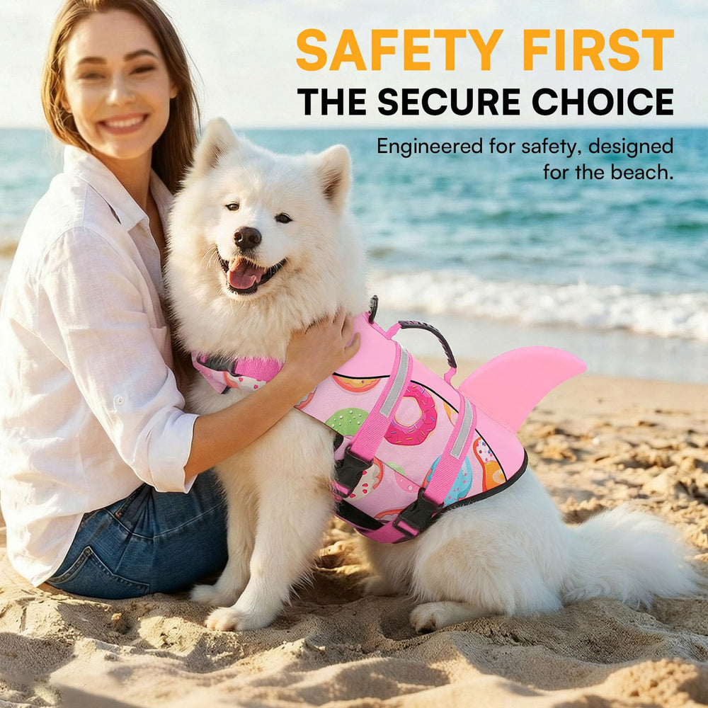 Queenmore dog life jacket shown in use while a dog swims.