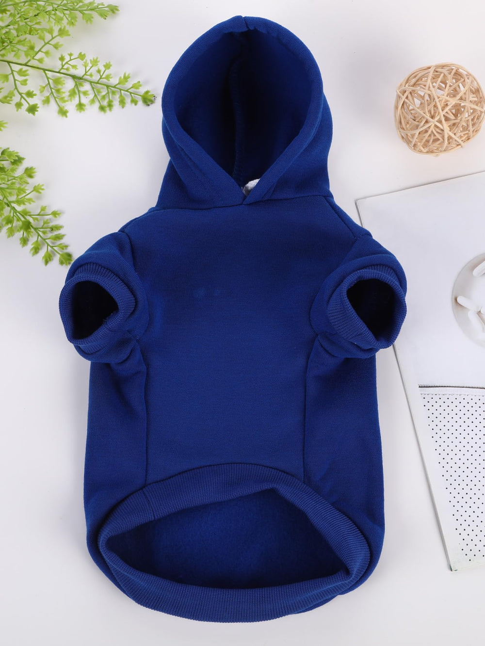 QWINEE dog hoodie shown from the side with its short sleeves.