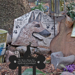 Rngmsi dog grave marker close-up showing the laser-cut metal design.