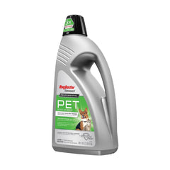 Rug Doctor Pet Deep Carpet Cleaner Solution shown being used on carpet.