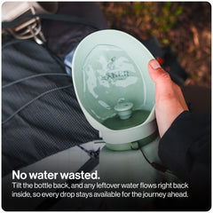 SÄKER portable dog water bottle folded down when empty.