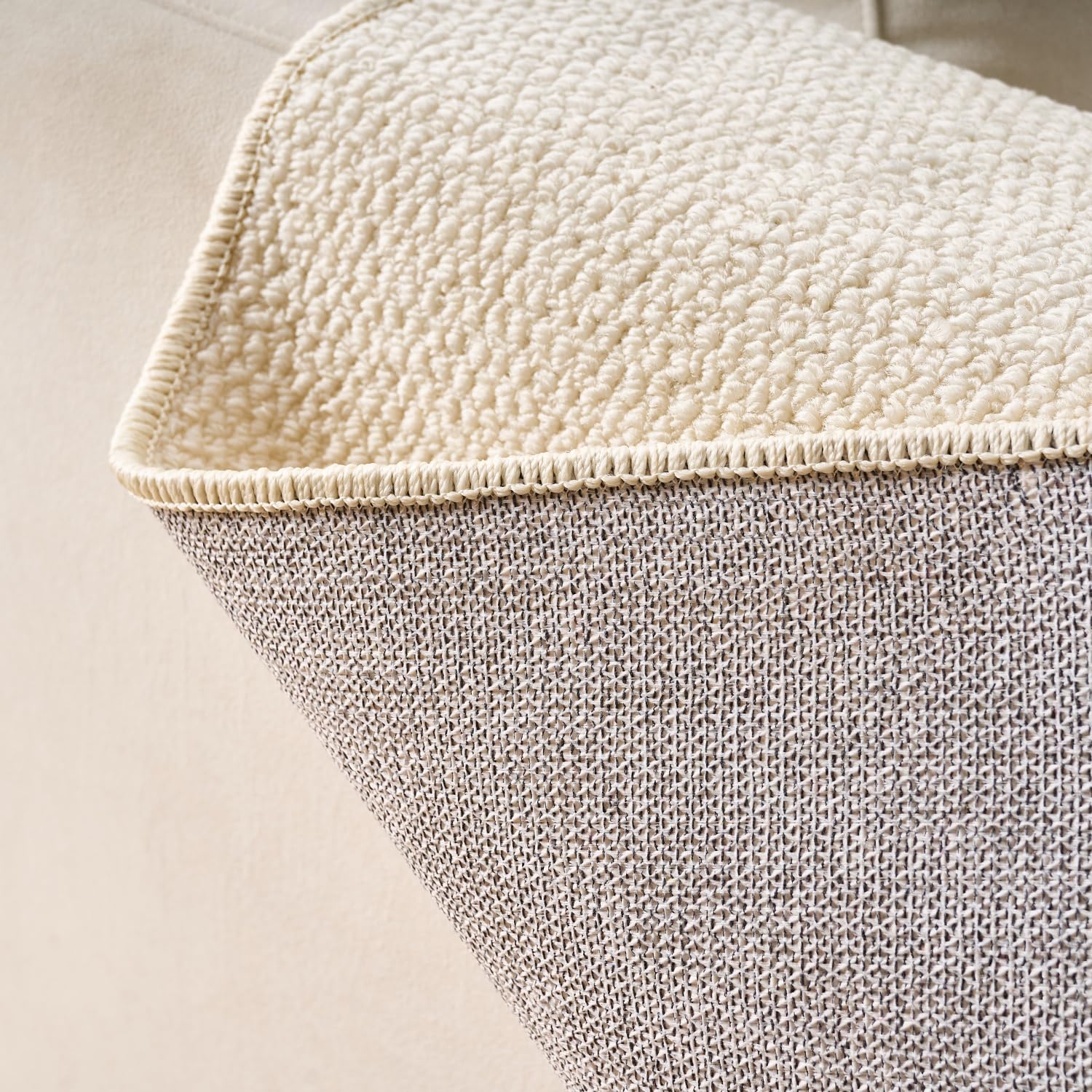 SHENGOCASE Cat Scratch Pad shown in place on a sofa armrest and corner.