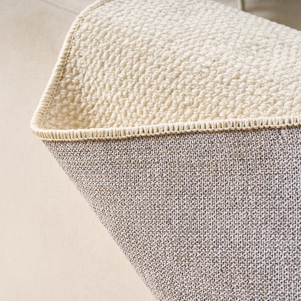 SHENGOCASE Cat Scratch Pad shown in place on a sofa armrest and corner.