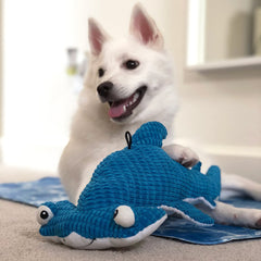 Snuggle Puppy Tender-Tuffs plush hammerhead shark dog toy shown in side profile.