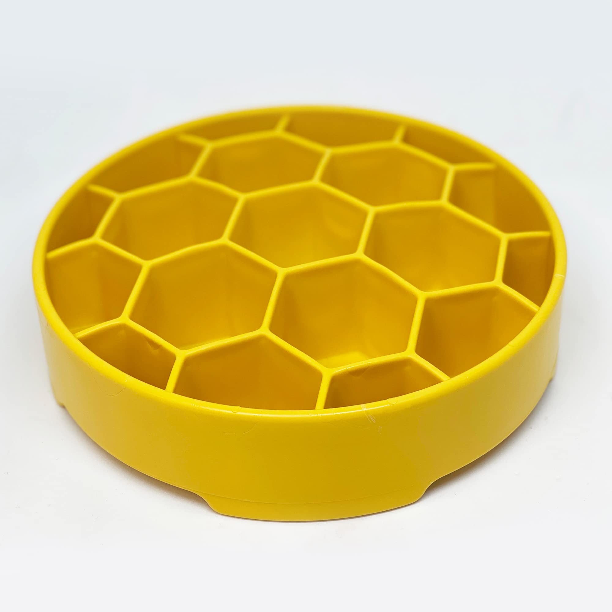 SodaPup Honeycomb Enrichment Bowl close-up showing its honeycomb feeding pattern.