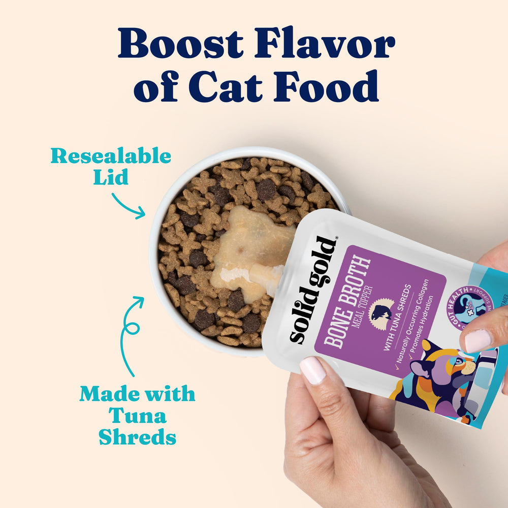 Solid Gold tuna bone broth cat topper showing the broth texture.