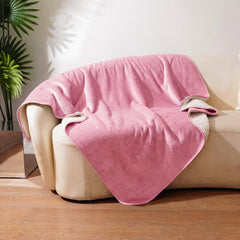Sunheir waterproof dog blanket shown from the front in pink.