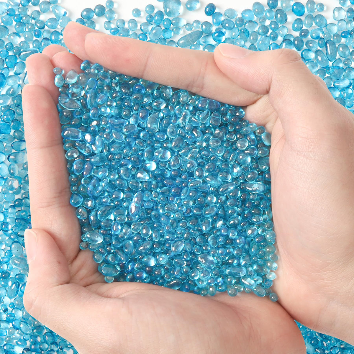 T4U Aquarium Gravel Rocks shown as blue glass pebbles from the front.