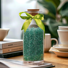 T4U green glass aquarium pebbles used to decorate a fish bowl.