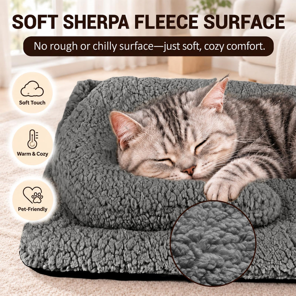 A cat curled up on the TailTastic self-warming cat bed.