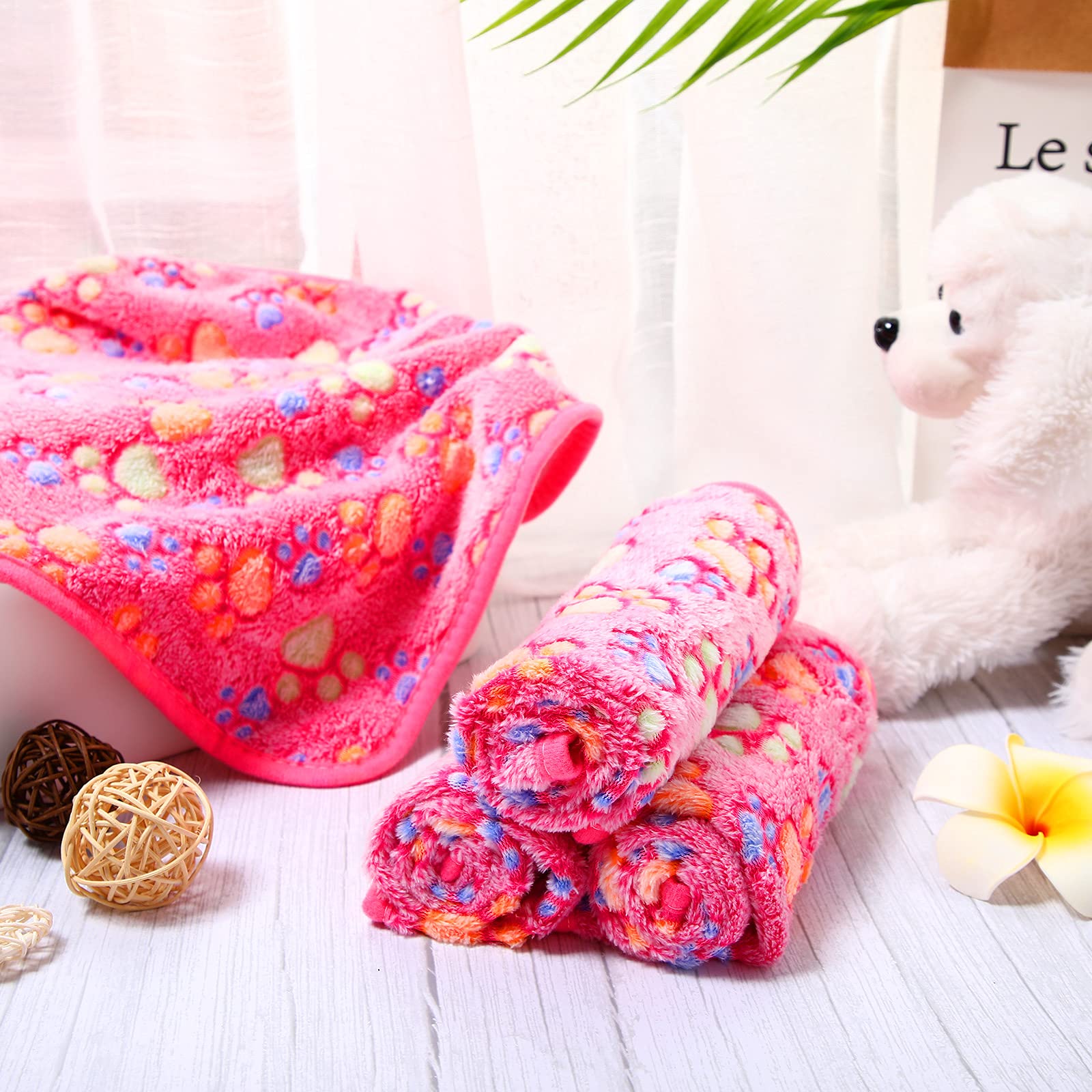 Tatuo fleece pet blanket shown folded for storage or travel.