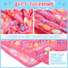 Tatuo fleece pet blanket providing a resting surface for a pet.