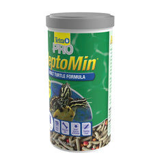 Tetra ReptoMin Pro Sticks offered to an aquatic turtle during feeding.