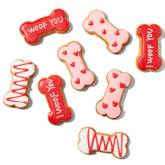 Thoughtfully Puppy Love dog treat gift set with a close view of a bone-shaped biscuit.