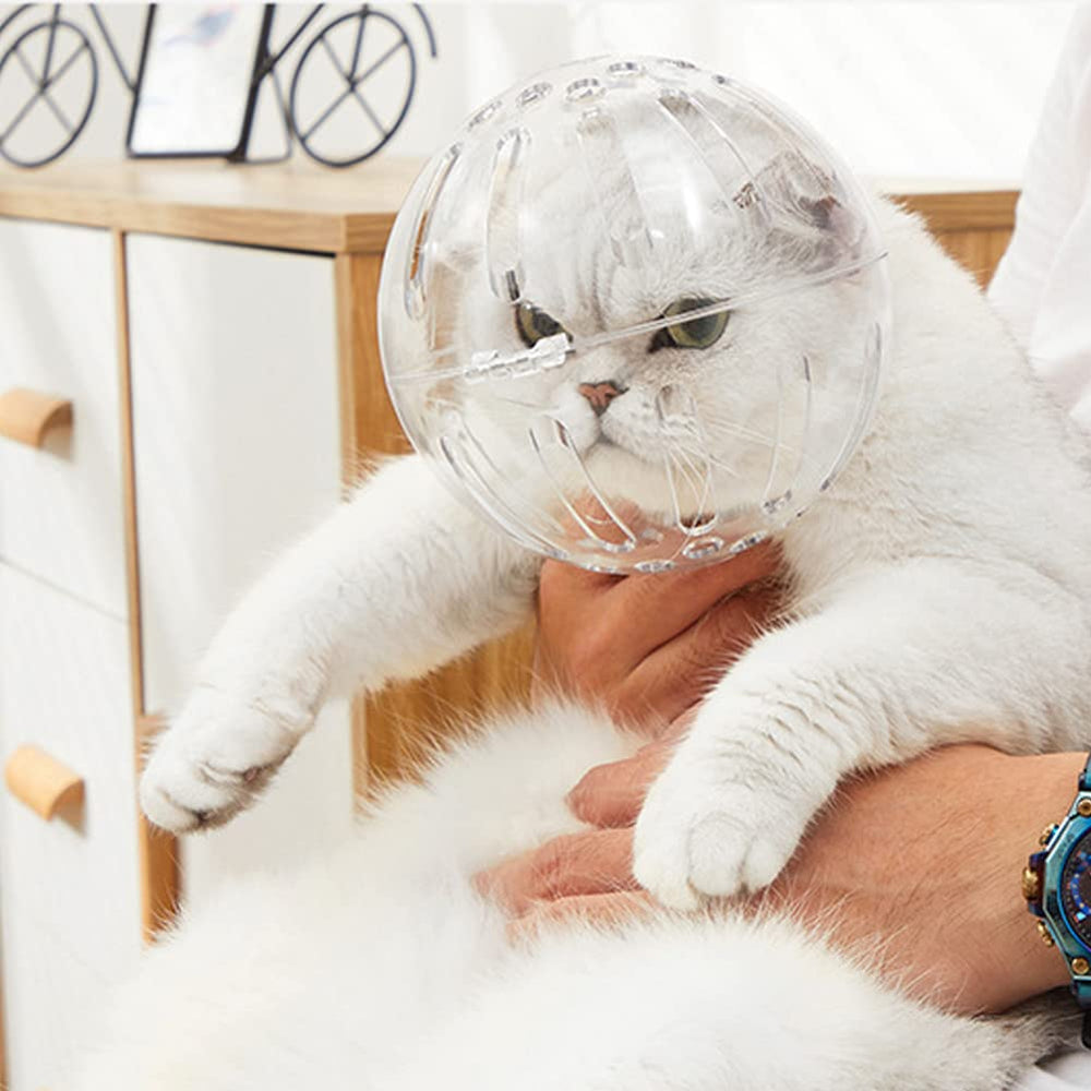 Trivolein cat grooming muzzle shown as an astronaut-style photo accessory.