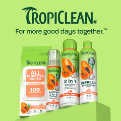 TropiClean dog shampoo and conditioner shown with a dog’s coat being brushed.