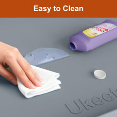 Ukeetap silicone mat shown as a surface for a cat litter area.