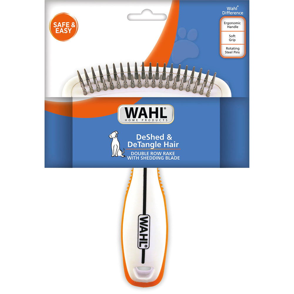 Wahl 2-in-1 pet rake shown grooming a dog with a dense coat.