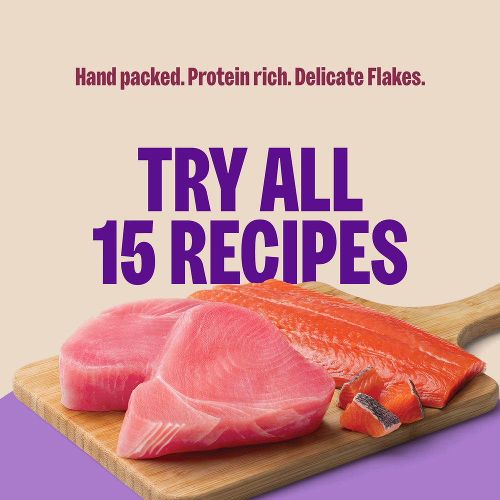 Wellness CORE flaked cat food with tuna and salmon flakes visible.