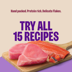 Wellness CORE flaked cat food with tuna and salmon flakes visible.