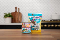 Weruva B.F.F. OMG cat food packaging showing the ingredient panel.