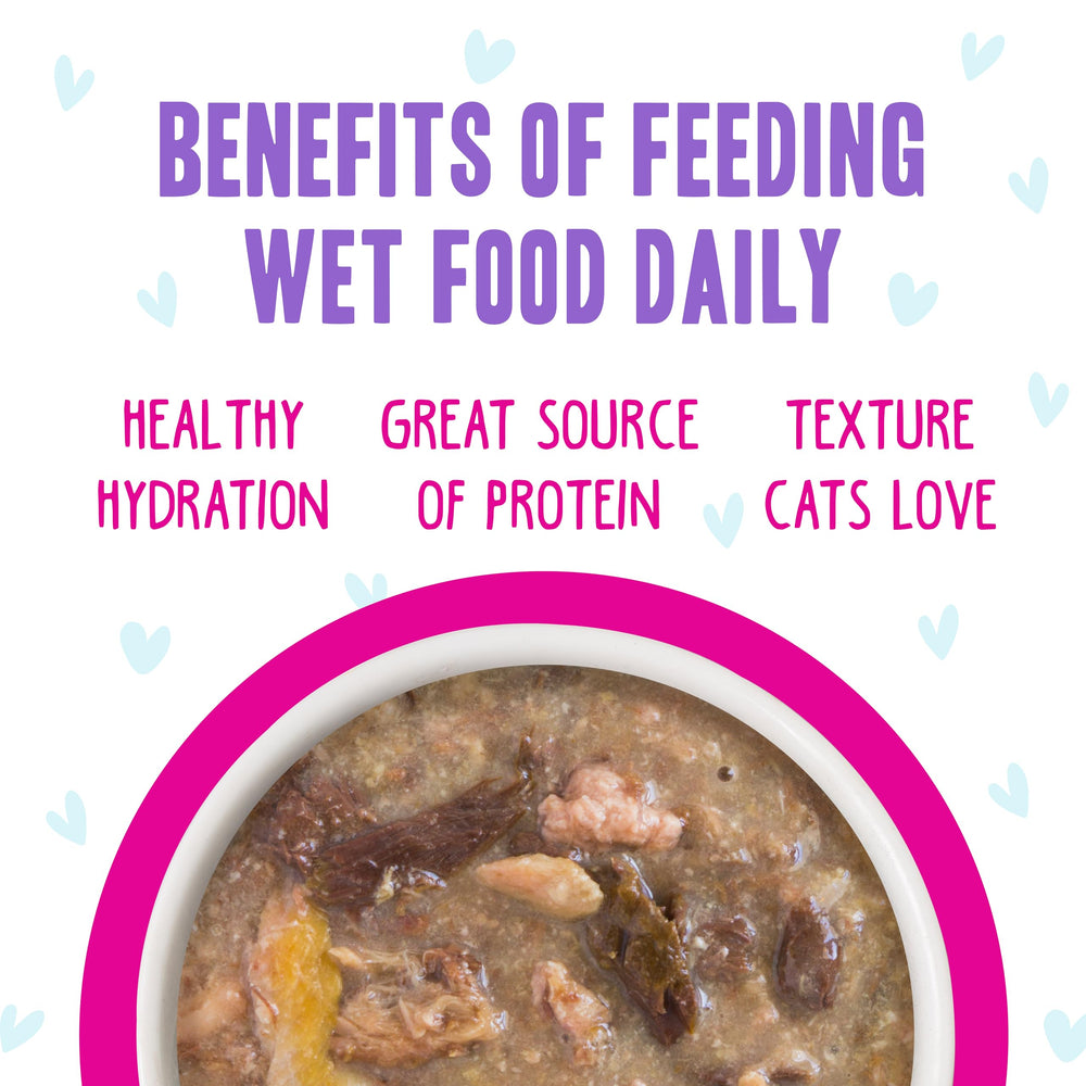 A cat eating Weruva cat food.