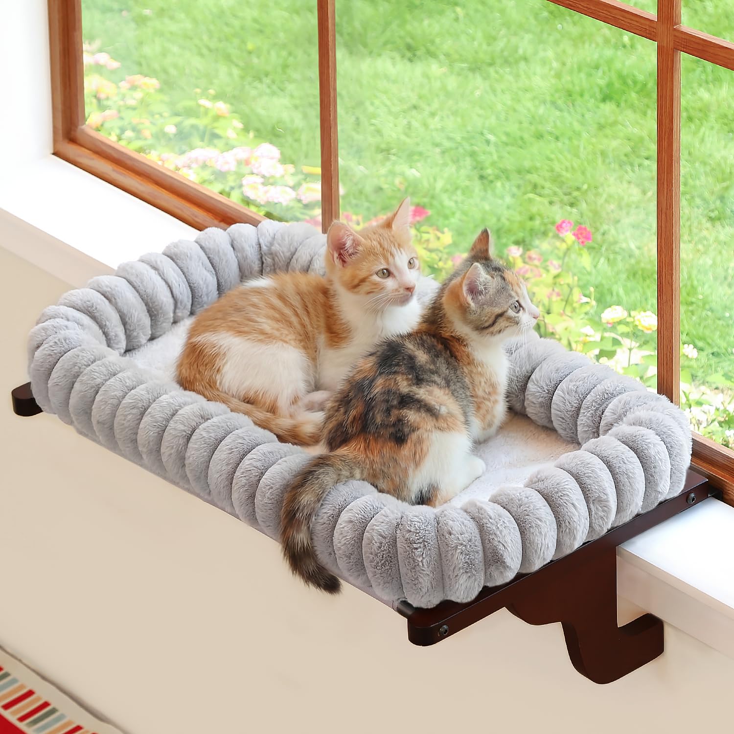 Zakkart cat window perch shown from the front with its gray bed and dark stained wood frame.